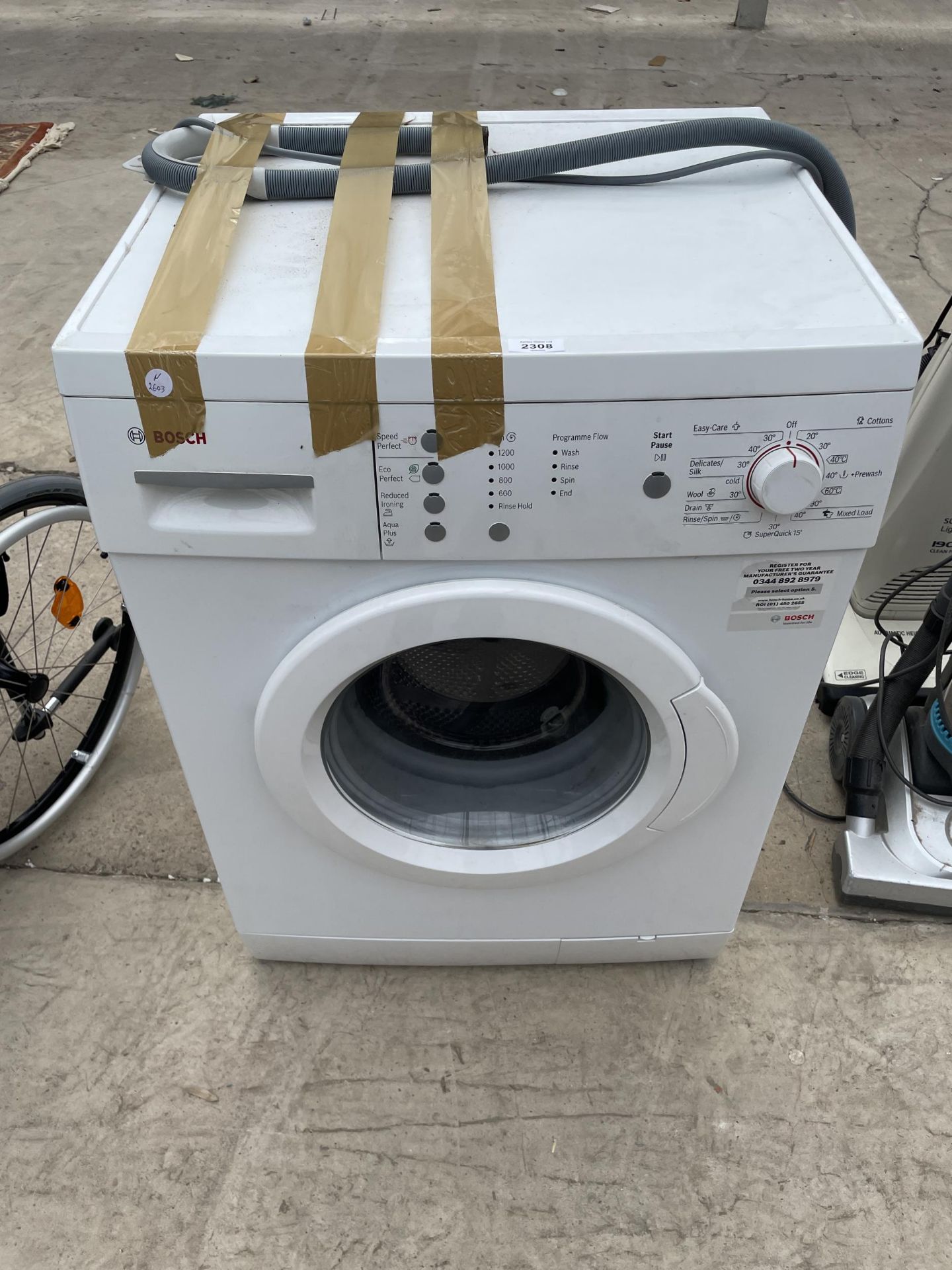 A WHITE BOSCH WASHING MACHINE