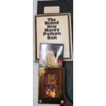 TWO VINTAGE MONTY PYTHON BOOKS AND TWO DVDS