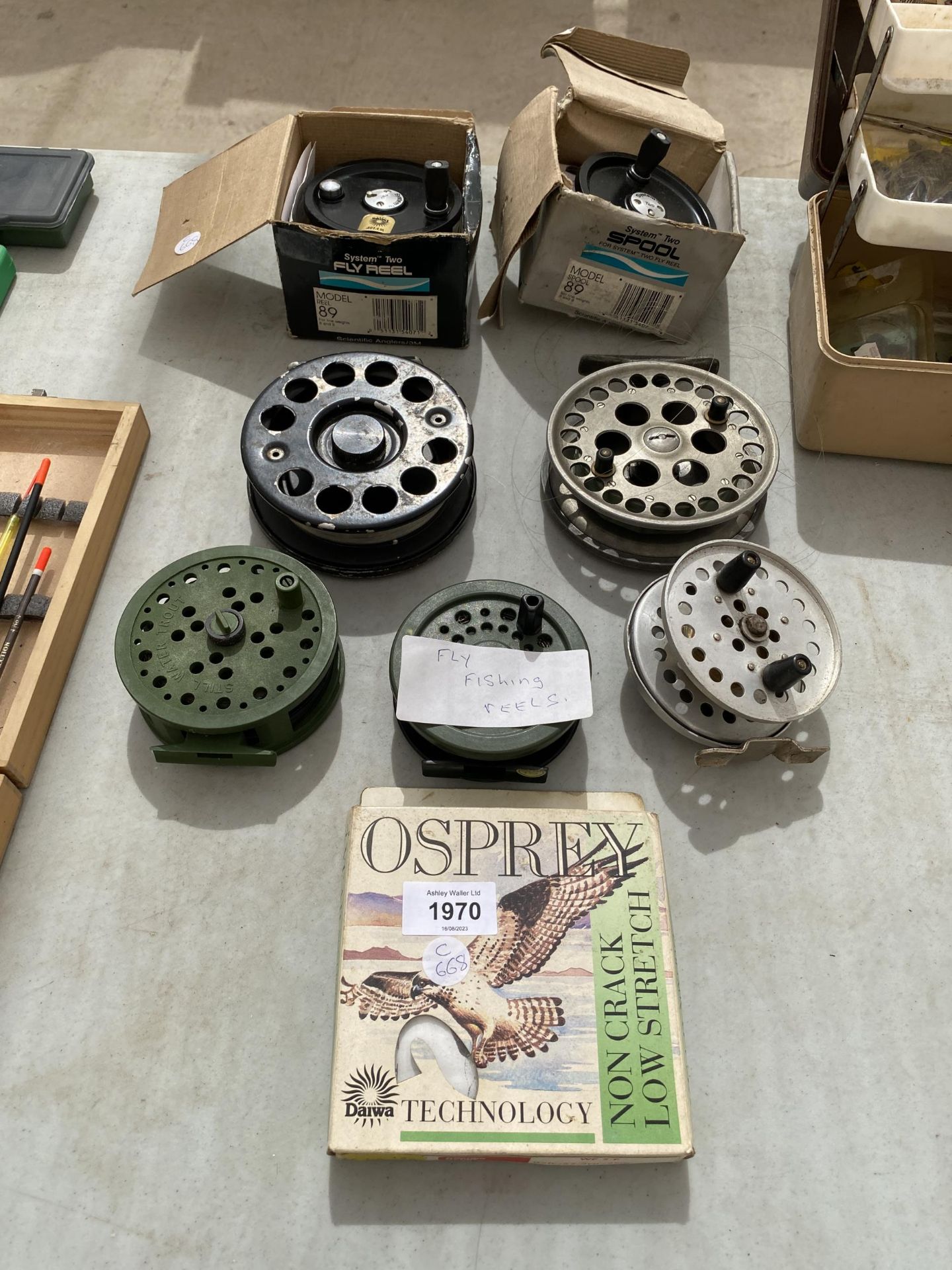 A COLLECTION OF FLY FISHING REELS ETC