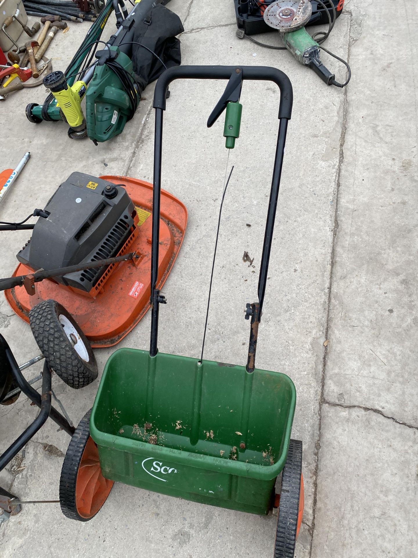 THREE GARDEN ITEMS TO INCLUDE TWO GRASS SEEDERS AND A PETROL FLYMO - Image 2 of 3