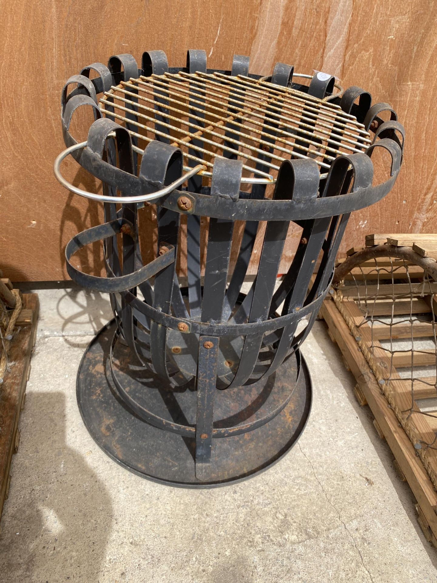 A WROUGHT IRON VINTAGE GRILL