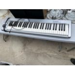 A M-AUDIO ELECTRIC KEYBOARD WITH BUILT IN EFFECTS