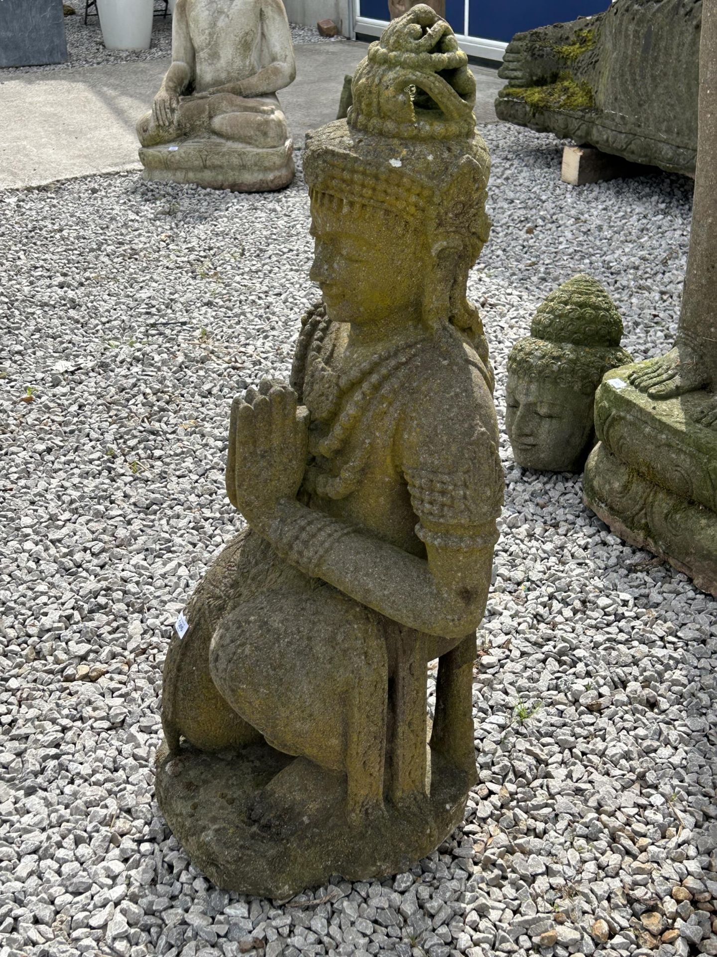 A LARGE RECONSTITUTED STONE BUDDHIST DIETY FIGURE - HEIGHT 108 CM, DEPTH 42 CM - Image 4 of 5