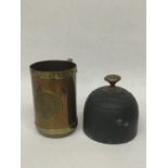 A BRASS AND COPPER TANKARD WITH DOORSTOP