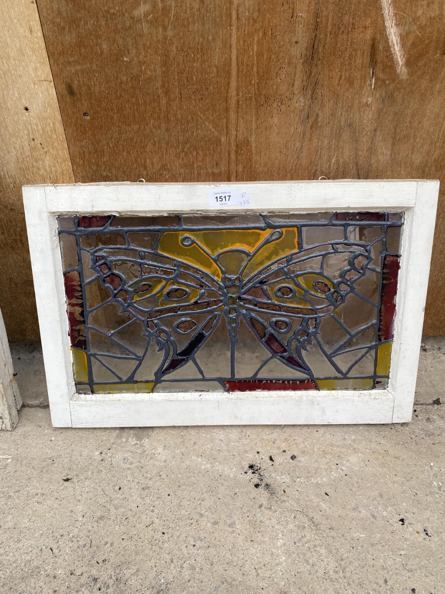 A VINTAGE LEADED GLASS PANEL WITH BUTTERFLY DESIGN