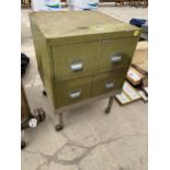 A VINTAGE FOUR DRAWER METAL CABINET