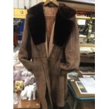 A VINTAGE SHEEPSKIN COAT WITH A FUR COLLAR