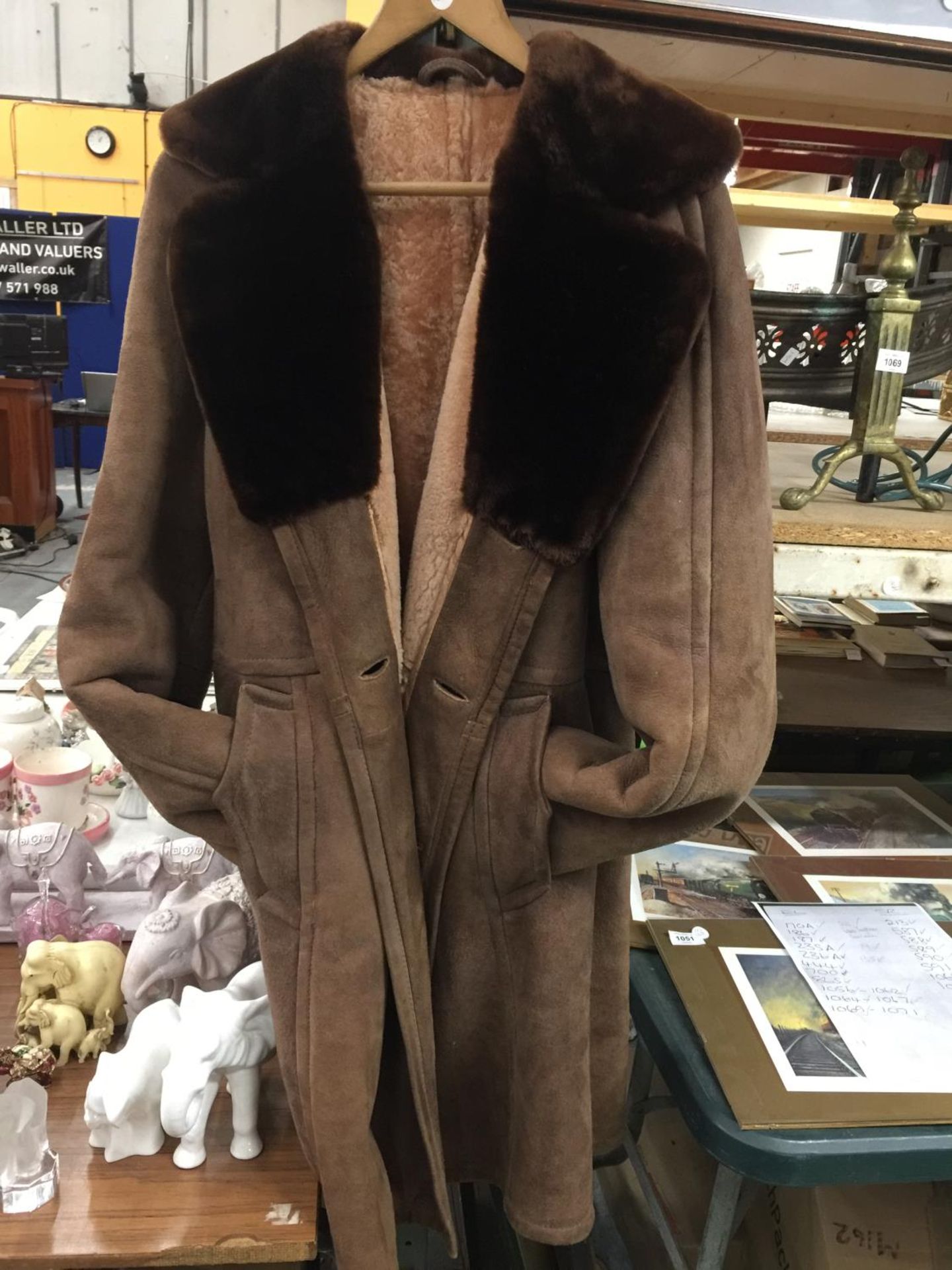 A VINTAGE SHEEPSKIN COAT WITH A FUR COLLAR