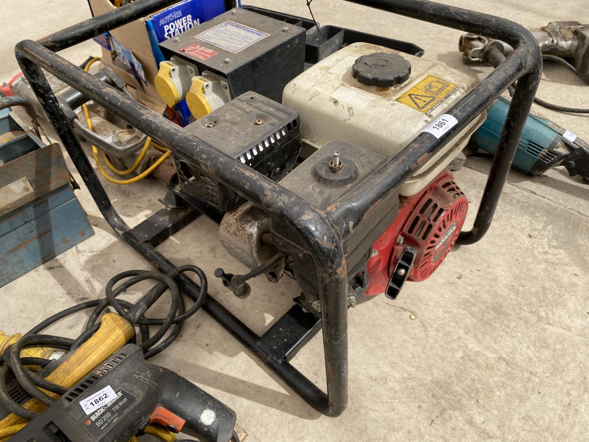 A VINTAGE 110V PETROL GENERATOR WITH HONDA ENGINE