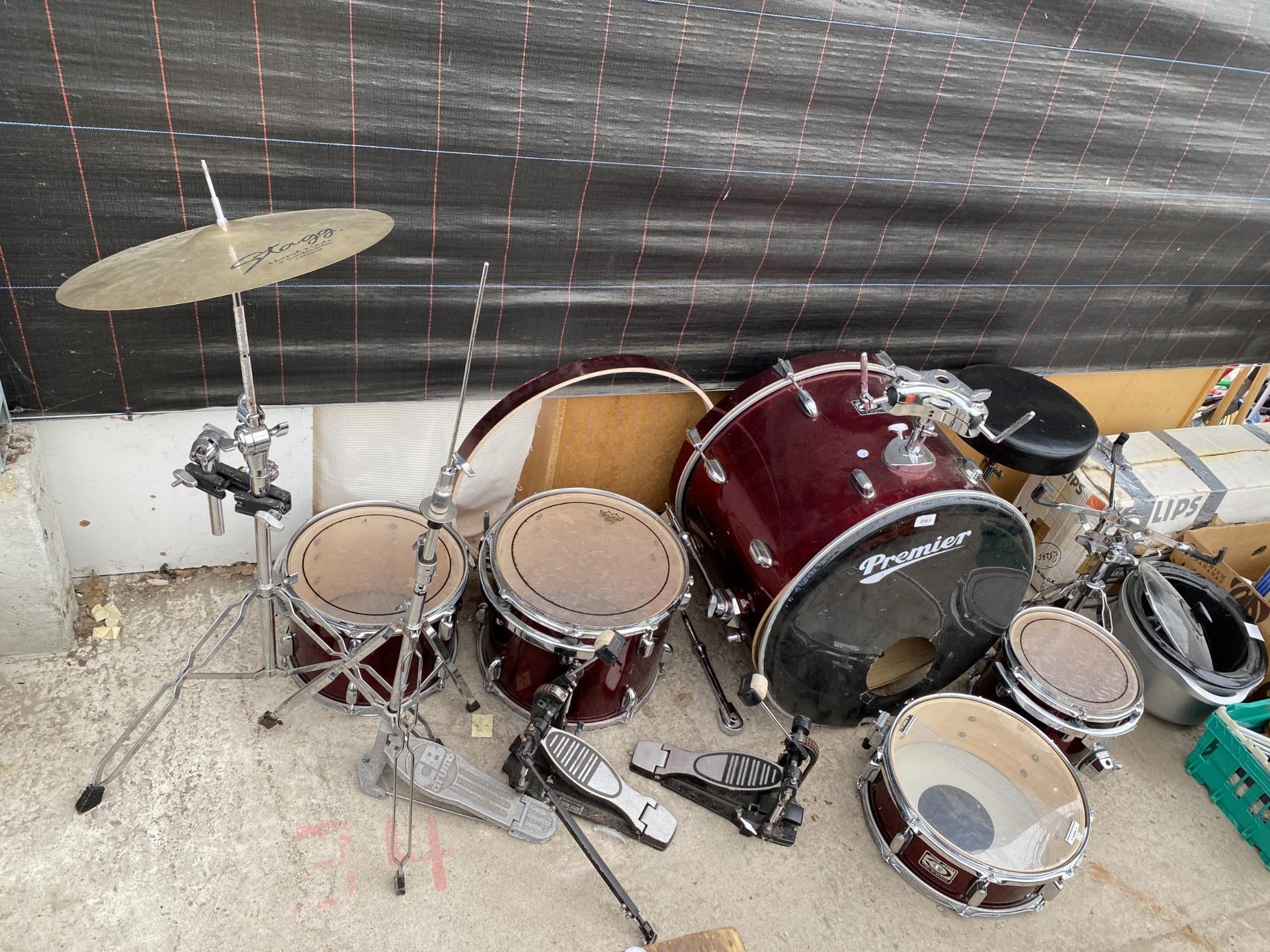 A PREMIER DRUM KIT WITH FOOT PEDALS AND SEAT