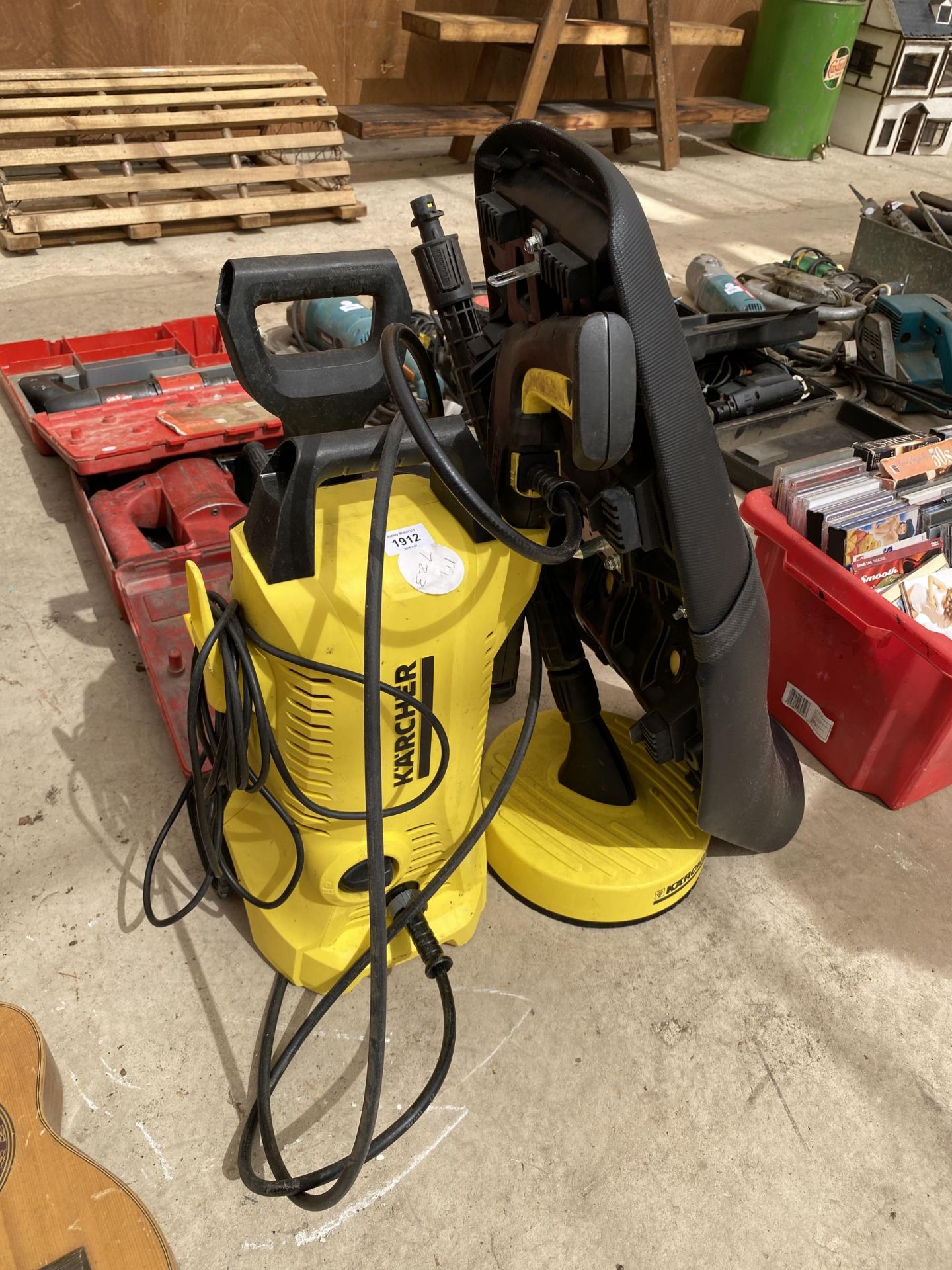 A KARCHER PRESSURE WASHER AND ATTACHMENTS