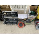 AN ASSORTMENT OF ITEMS TO INCLUDE A BBQ SET, EXTENSION LEADS, ETC