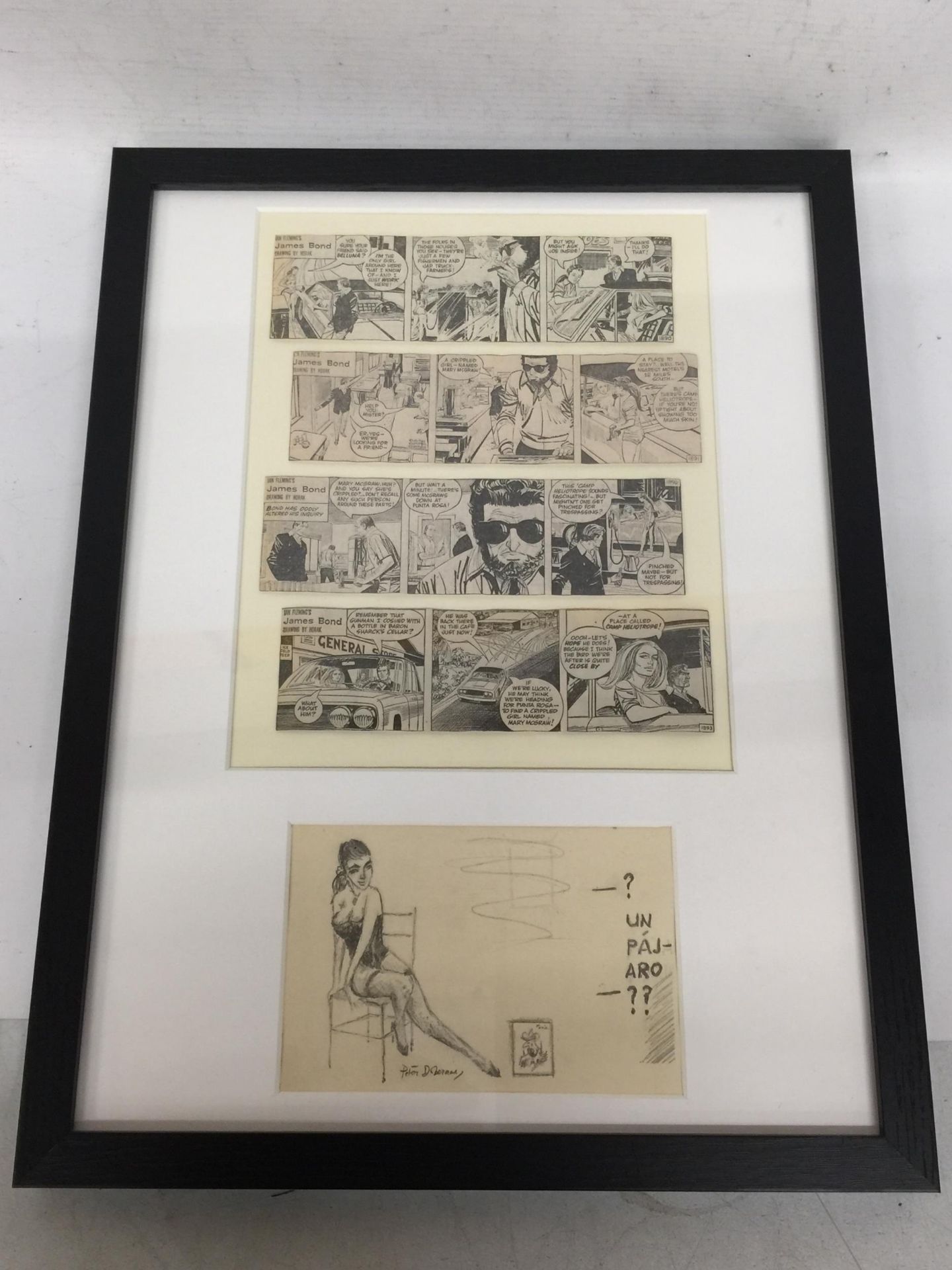 A FRAMED JAMES BOND IAN FLEMING COMIC BOOK STRIP WITH LOWER PENCIL SIGNED DRAWING OF A LADY,