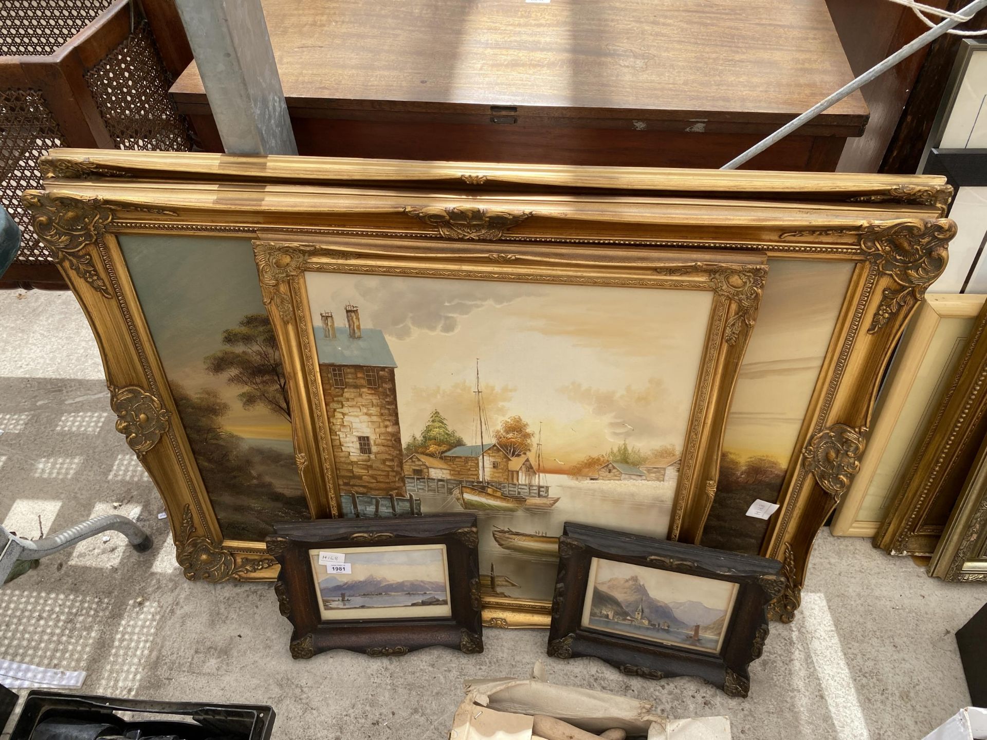 A COLLECTION OF GILT FRAMED PAINTINGS AND PICTURES TO INCLUDE VILLAGE FISHING SCENE ETC