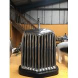 A CHROME STYLE JAGUAR RADIATOR ON BASE