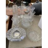 AN ASSORTMENT OF CUT GLASS WARE TO INCLUDE A WORLD CLOCK, A CLARET JUG AND VASES ETC