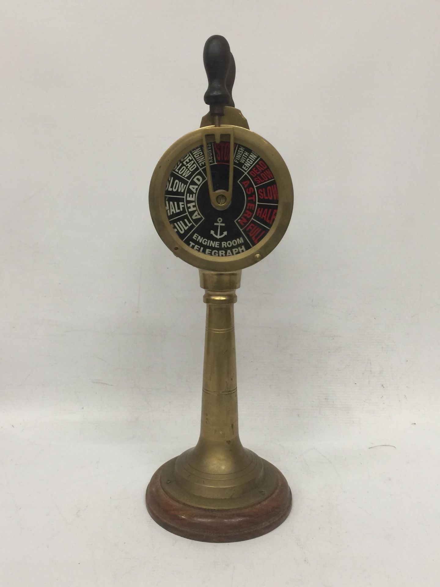 A VINTAGE STYLE BRASS ENGINE ROOM TELEGRAPH ON WOODEN STAND