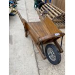 A VINTAGE TEAK GARDEN BARROW / PLANTER