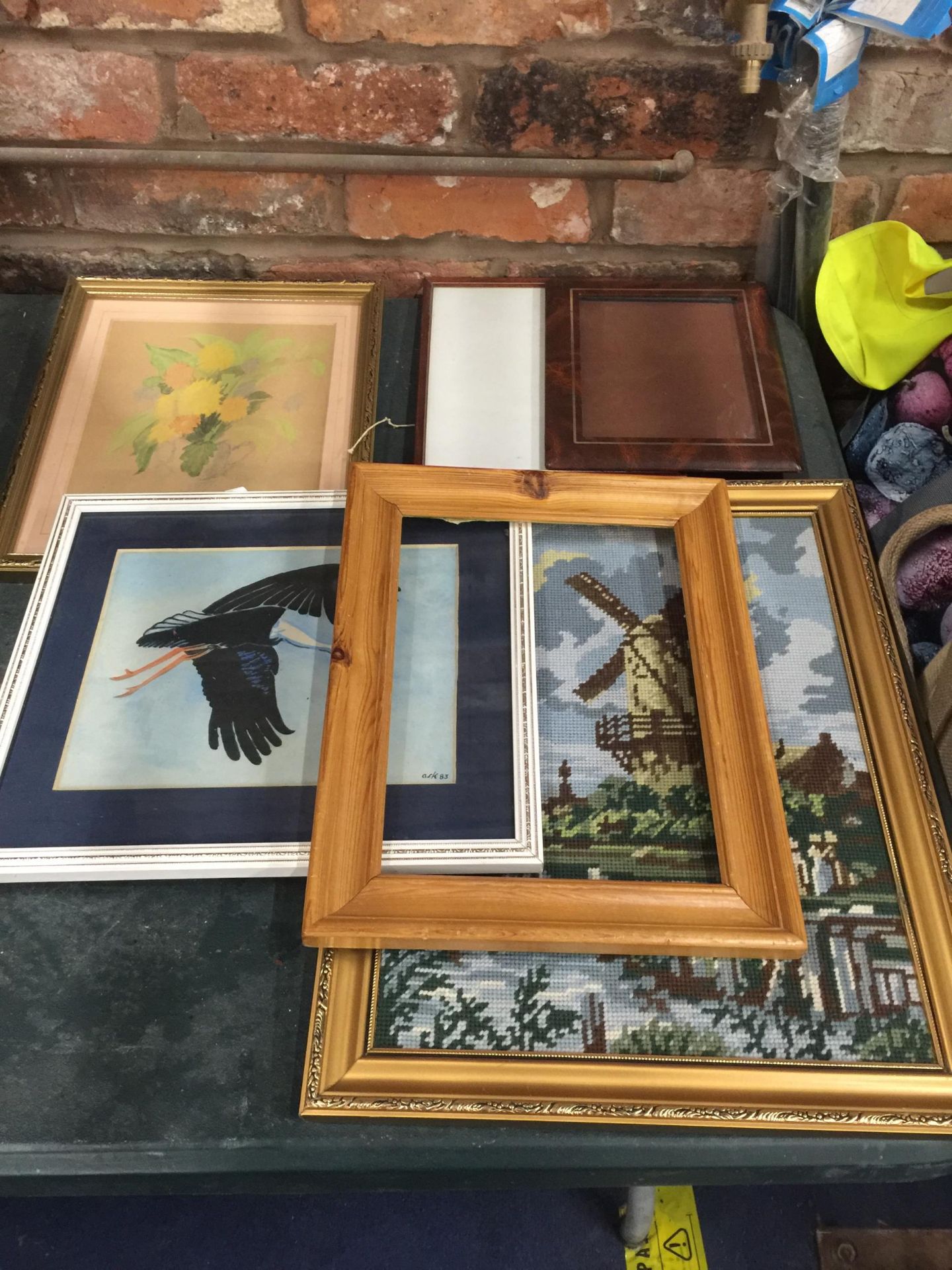 A GILT FRAMED TAPESTRY OF A WINDMILL, FURTHER GILT FRAMED FLORAL PRINT, STORK WATERCOLOUR ETC