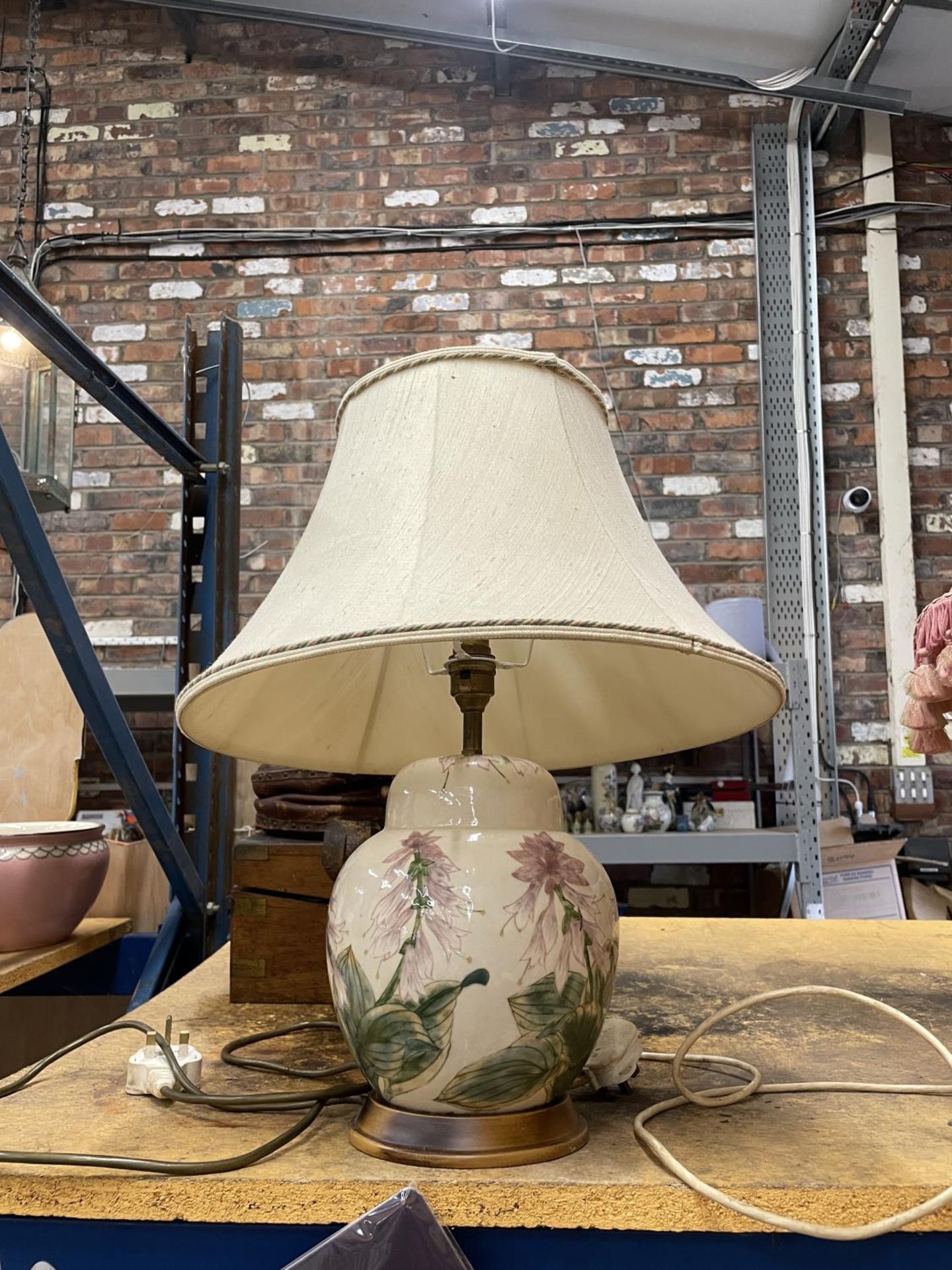 A COBRIDGE CERAMIC TABLE LAMP WITH SHADE