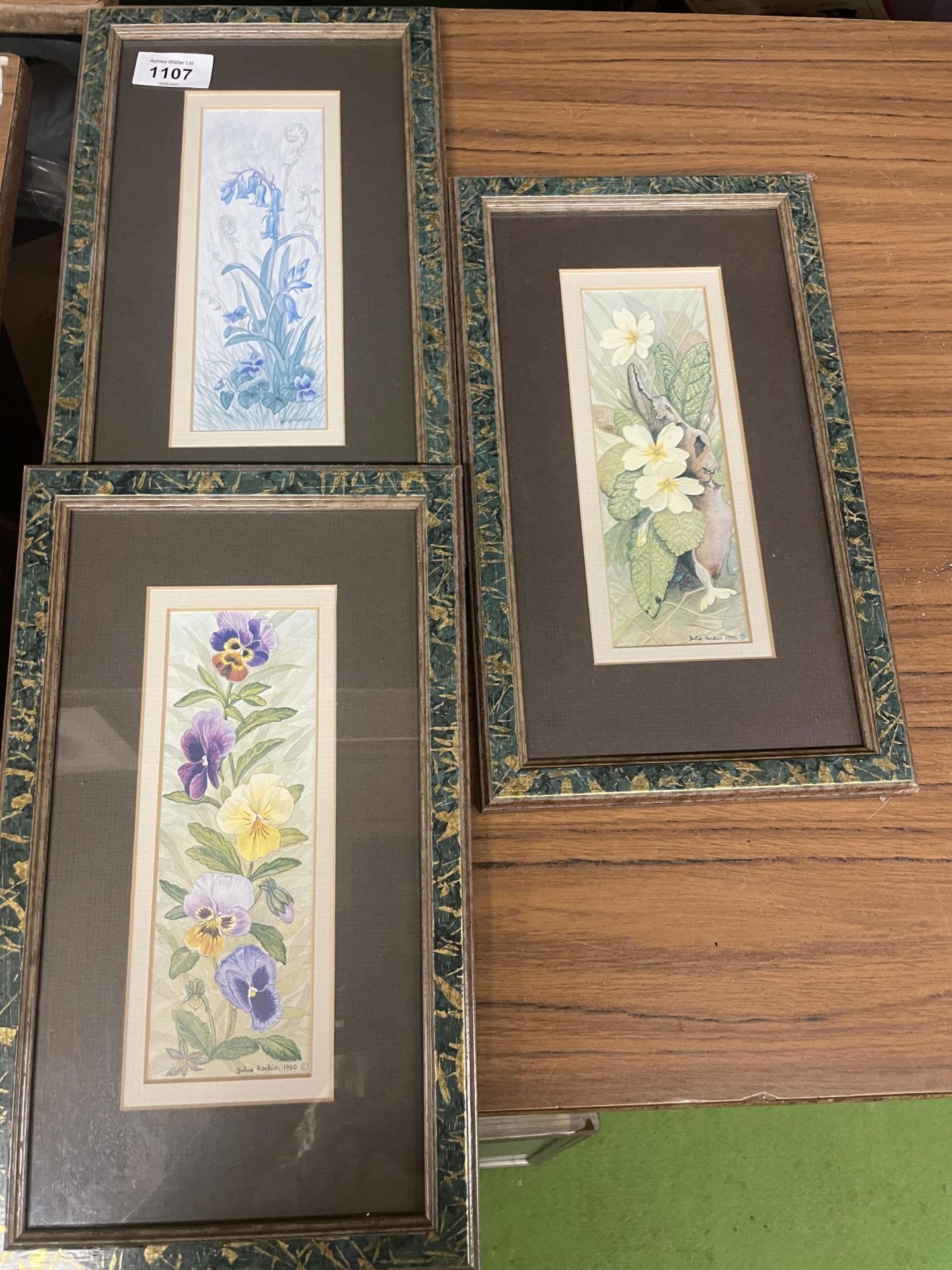 A GROUP OF THREE FRAMED FLORAL PRINTS