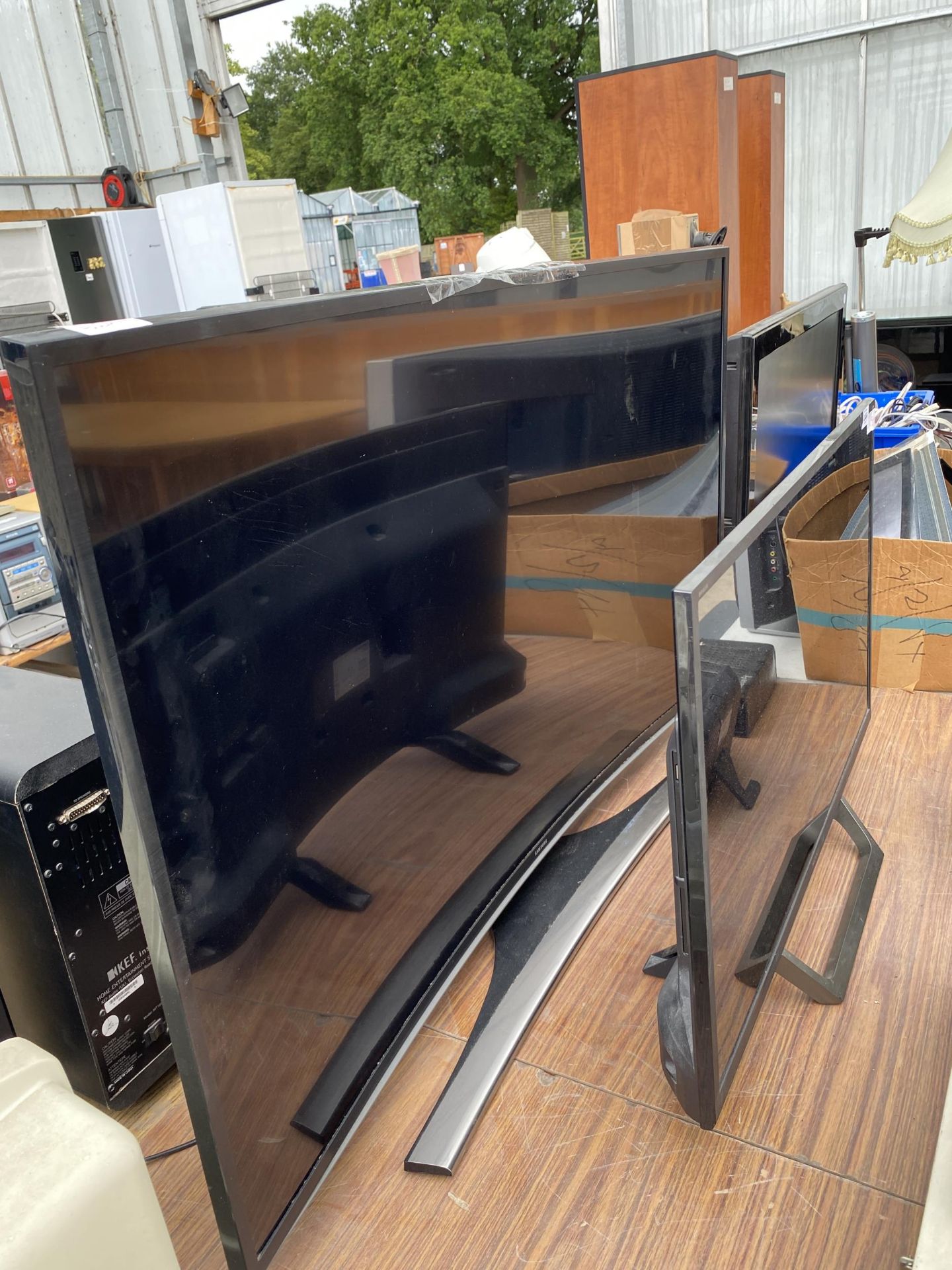 A SONY FLATSCREEN TELEVSION TOGETHER WITH LARGER CURVED SAMSUNG TELEVISION - Image 2 of 3