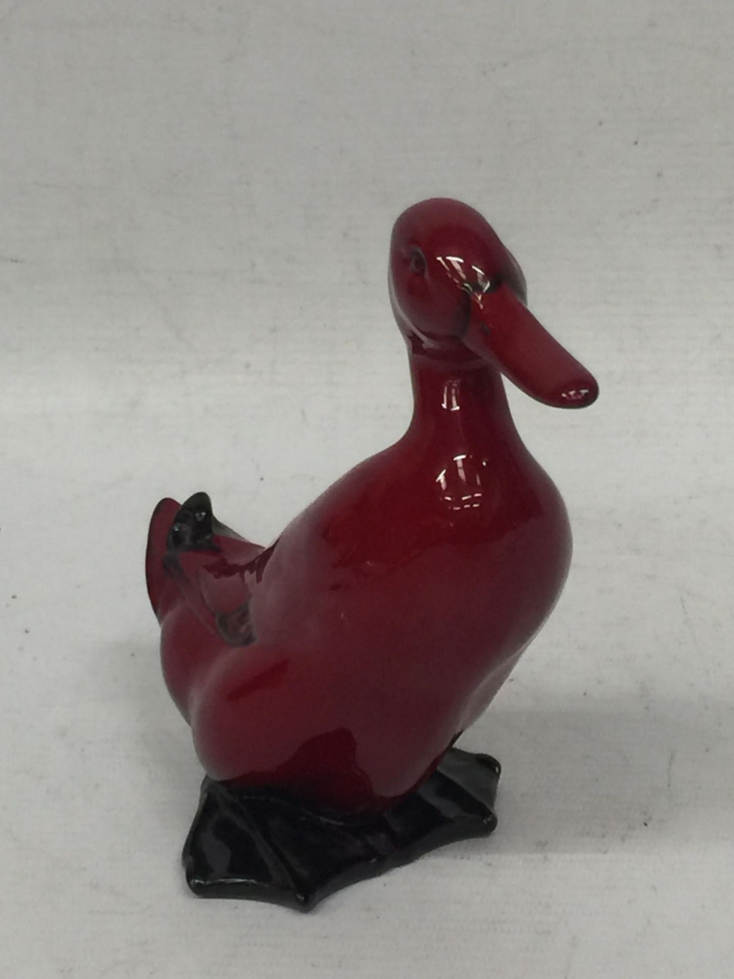 A ROYAL DOULTON FLAMBE DUCK FIGURE