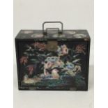 A JAPANESE LACQUERED AND MOTHER OF PEARL DESIGN JEWELLERY BOX