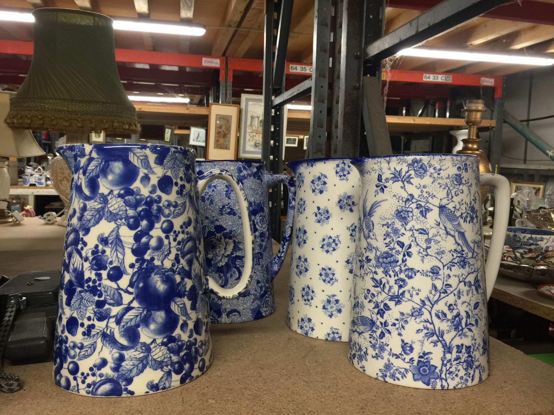 A GROUP OF FOUR VINTAGE BLUE AND WHITE JUGS, HILLCHURCH ETC