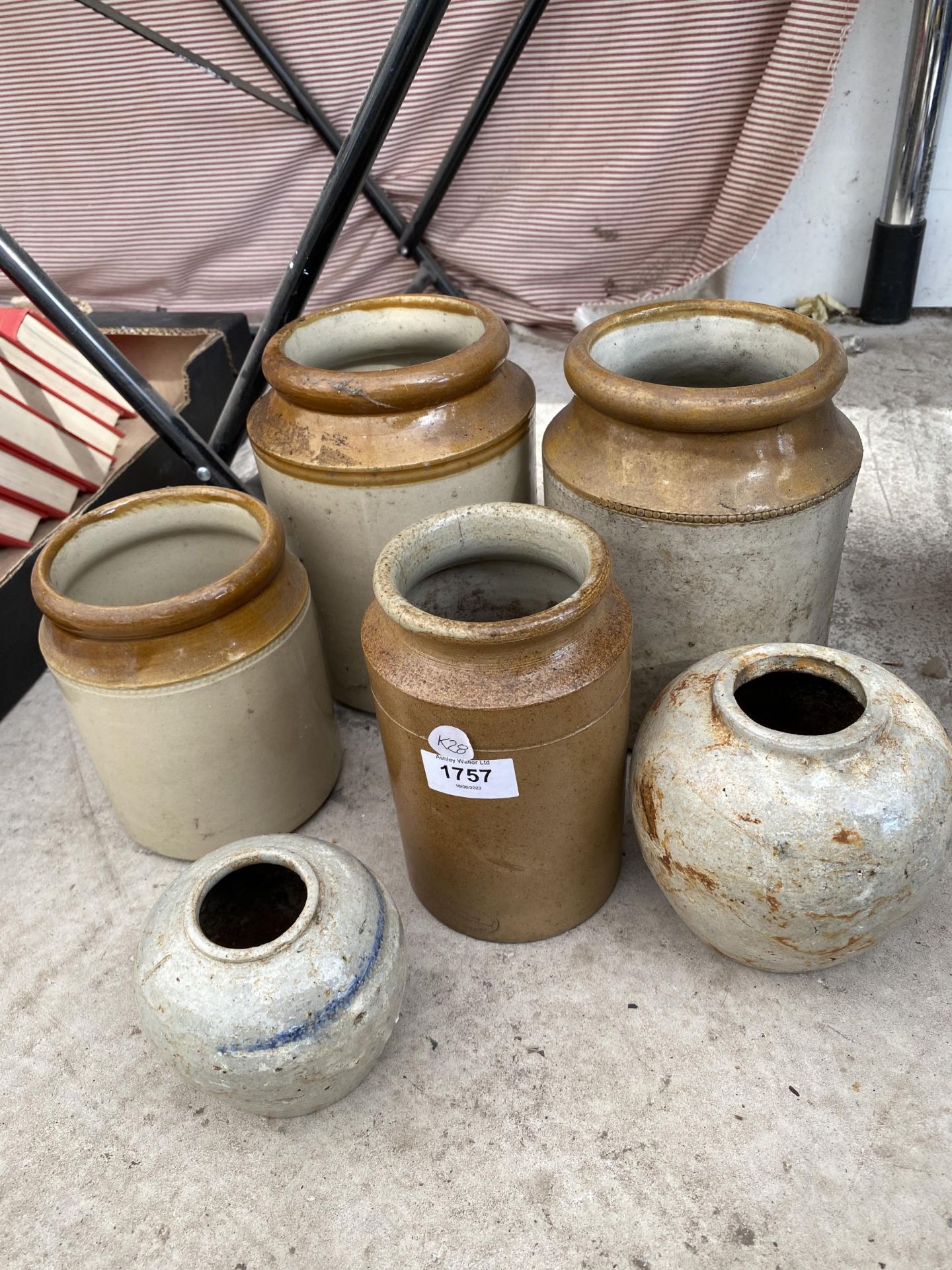 A COLLECTION OF STONEWARE STORAGE JARS
