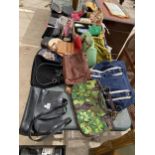 A COLLECTION OF HAND BAGS IN ASSORTED COLOURS AND MATERIALS INCLUDING LEATHER ETC