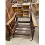 AN EARLY 20TH CENTURY OAK RECLINING CHAIR FRAME