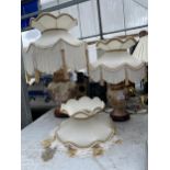 TWO VINTAGE DECORATIVE TABLE LAMPS WITH CREAM SHADES AND FURTHER SHADE