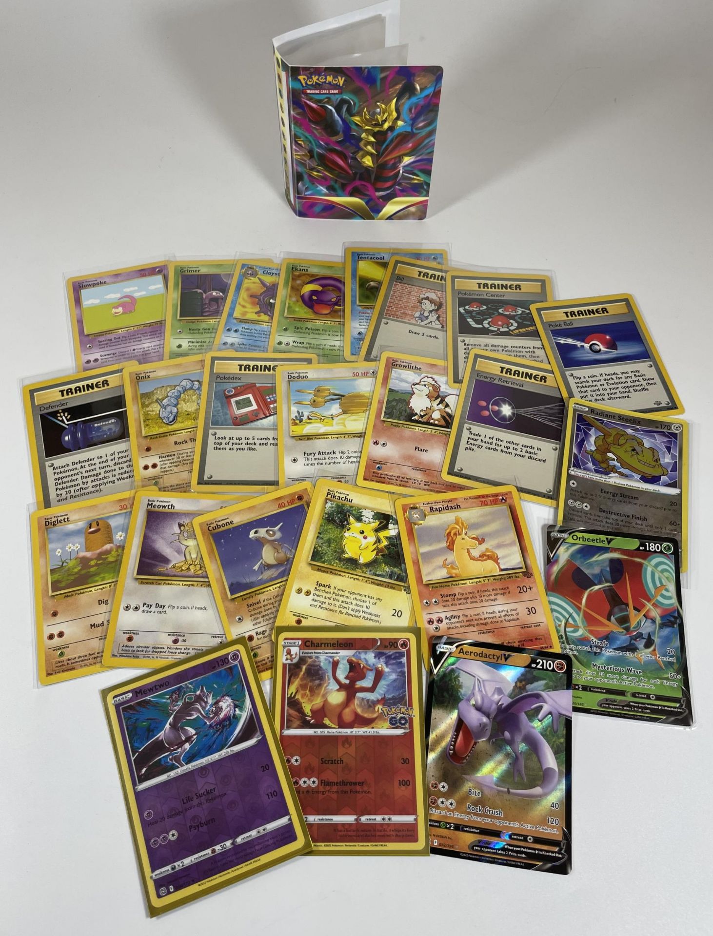 A SMALL POKEMON FOLDER OF CARDS - JUNGLE SET 1999 PIKACHU, FURTHER WOTC CARDS, MEWTWO RADIANT
