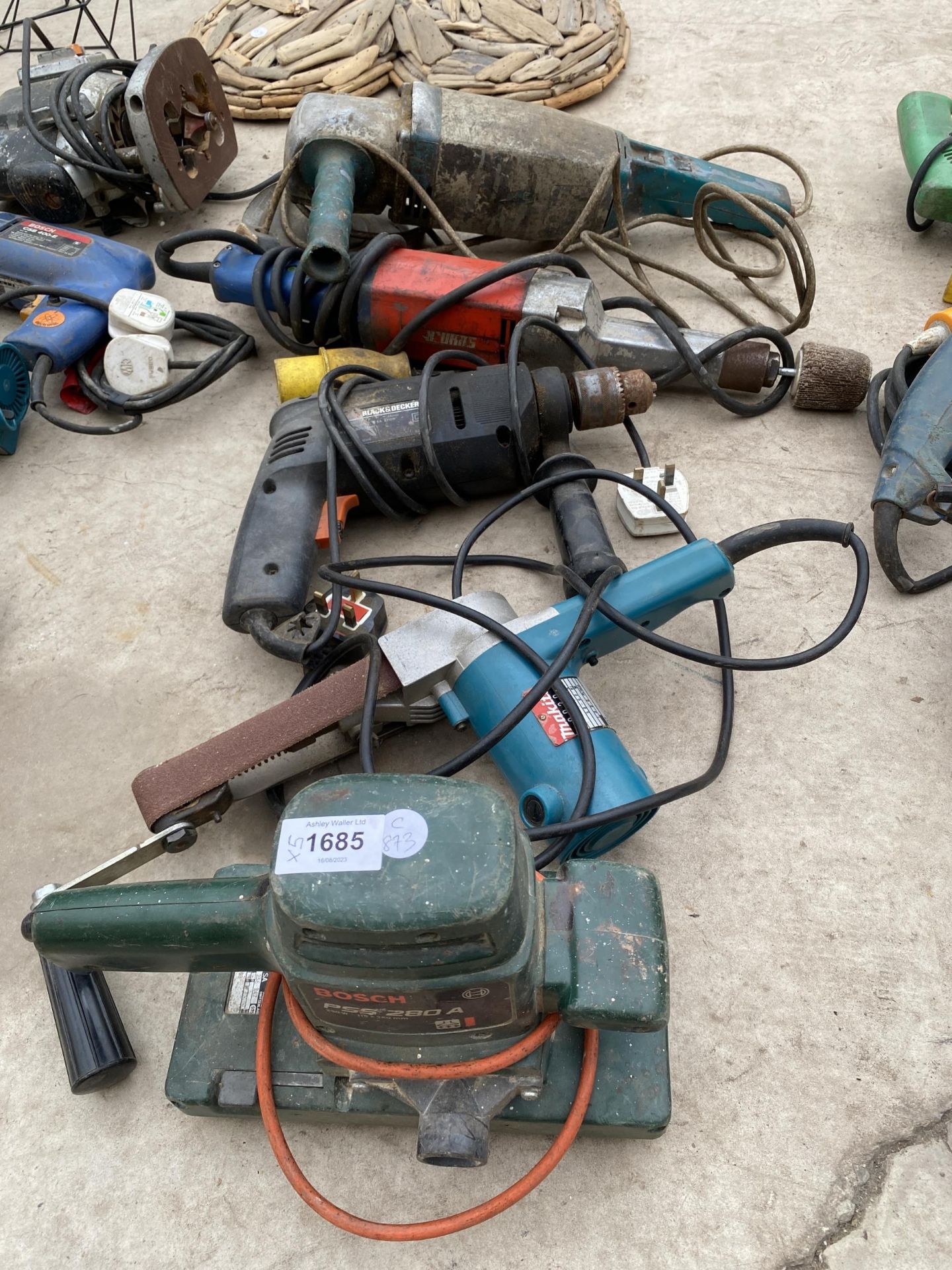 FIVE ASSORTED POWER TOOLS, DRILLS ETC