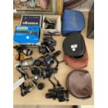 A COLLECTION OF FISHING REELS, SHAKESPEARE, OKUMA ETC