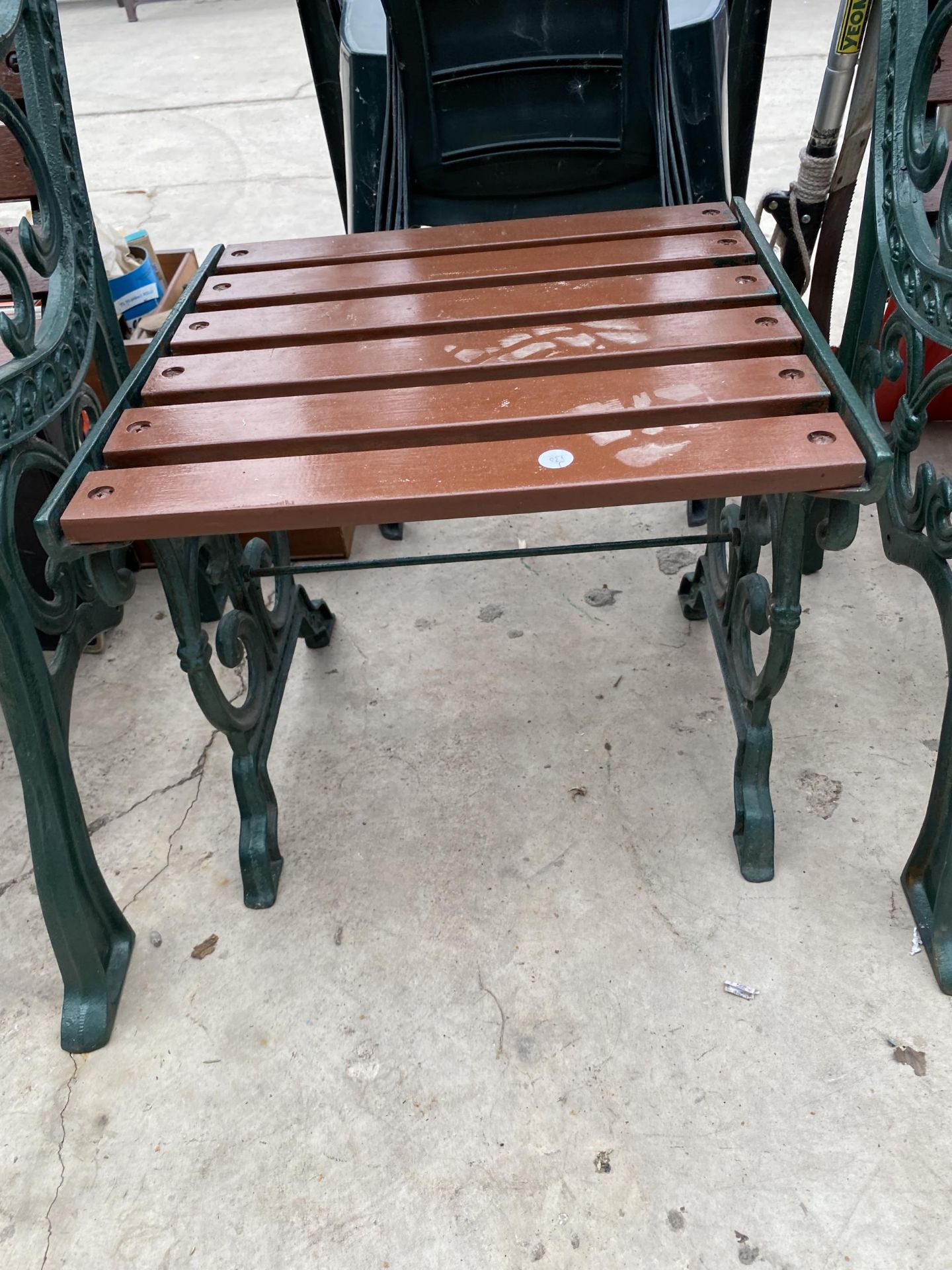 TWO WOODEN SLATED GARDEN CHAIRS AND A SIDE TABLE ALL WITH CAST IRON ENDS - Image 3 of 4