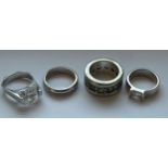 FOUR SILVER DRESS RINGS GROSS WEIGHT 40.46 GRAMS