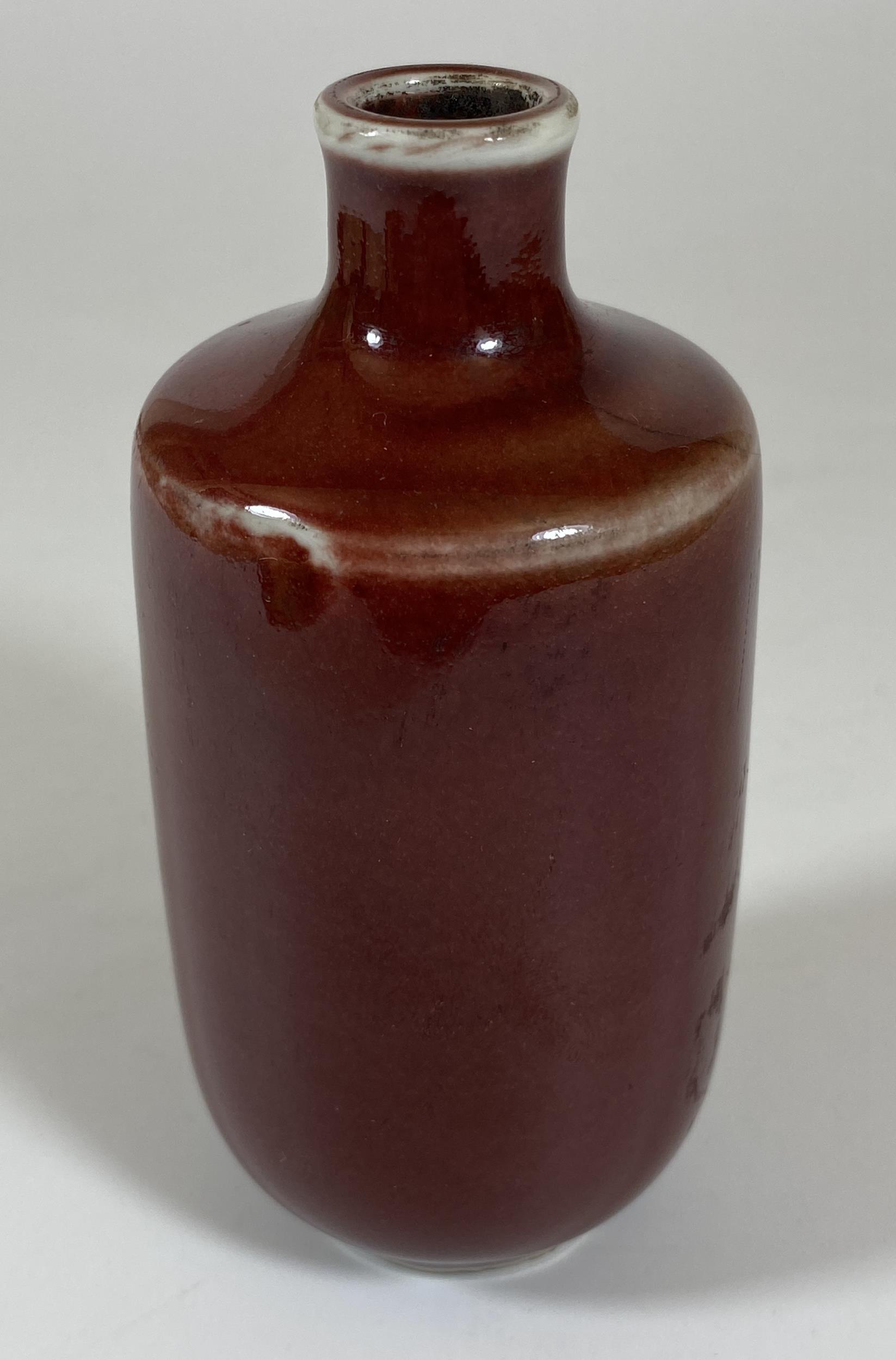 A CHINESE SANG DE BOEUF BOTTLE VASE, HEIGHT 12CM