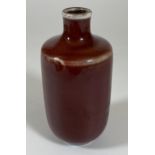 A CHINESE SANG DE BOEUF BOTTLE VASE, HEIGHT 12CM