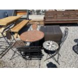 A GARDEN PATIO BISTRO SET WITH FOUR FOLDING METAL CHAIRS AND A RATTAN CUBE STORAGE