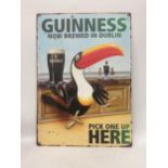 A METAL GUINNESS BAR SIGN