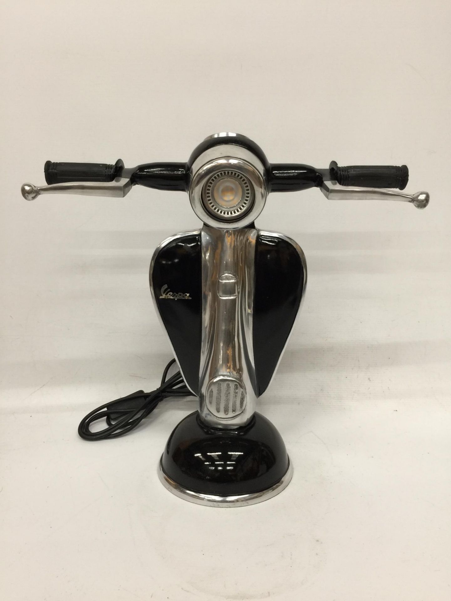 A BLACK VESPA SCOOTER TABLE LAMP