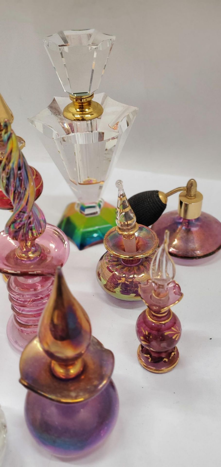 A COLLECTION OF GLASS SCENT BOTTLES WITH STOPPERS - Image 3 of 3