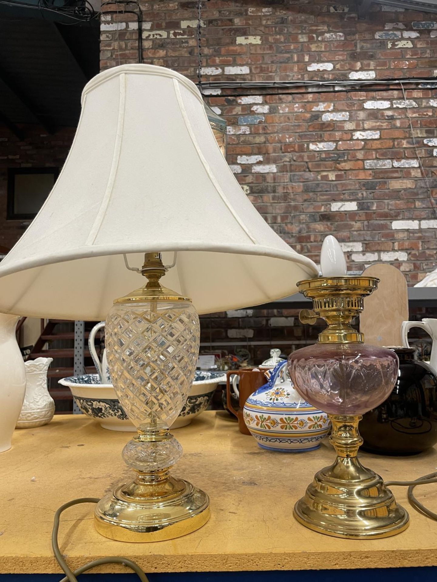 TWO BRASS AND GLASS TABLE LAMPS ONE WITH A SHADE