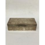 A LONDON HALLMARKED SILVER CIGARETTE BOX WITH INNER WOOD LINING