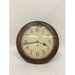 A VINTAGE CIRCULAR RAILWAY CHIMING CLOCK