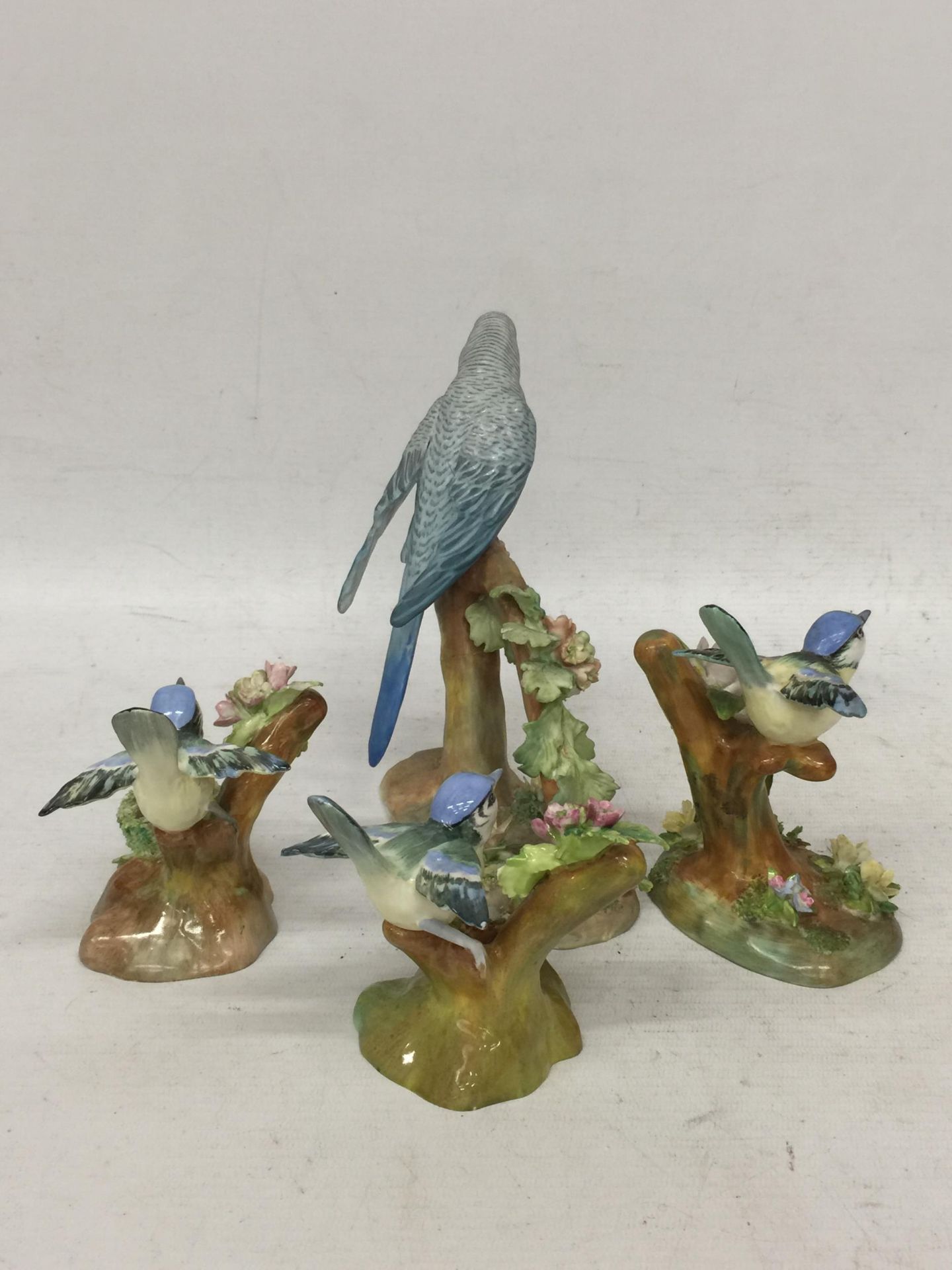 A SET OF FOUR CROWN STAFFORDSHIRE BIRD FIGURES, SOME AT FAULT - Image 2 of 5