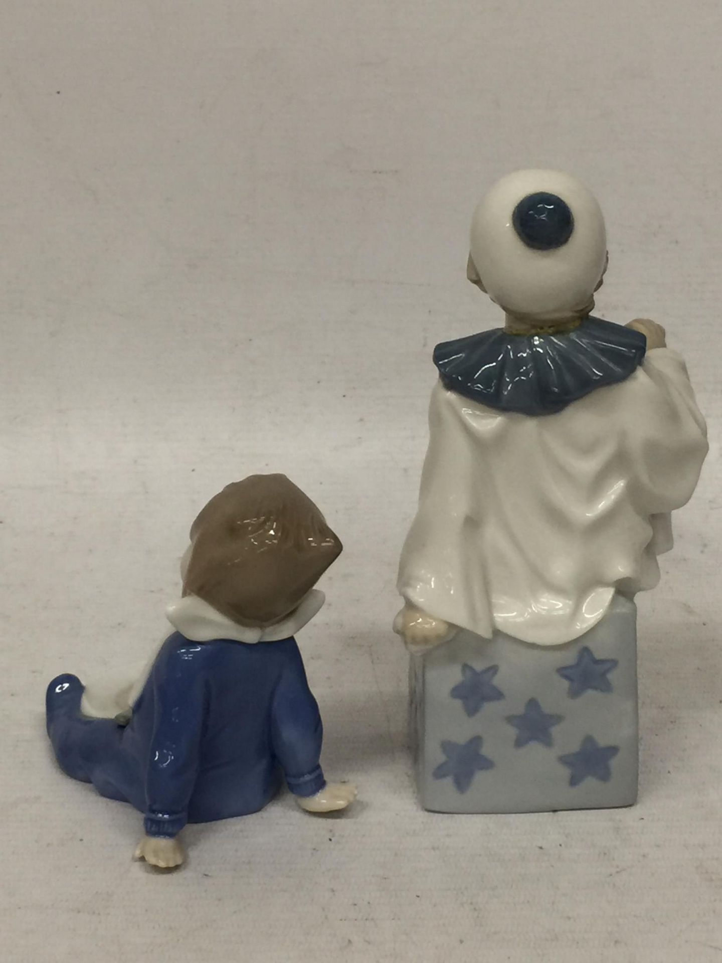 TWO FIGURES - A NAO FIGURE OF A CHILD AND A CASADES CLOWN - Image 3 of 4