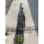 A FOLDING CASE OF ASSORTED FISHING RODS, CARP RODS ETC